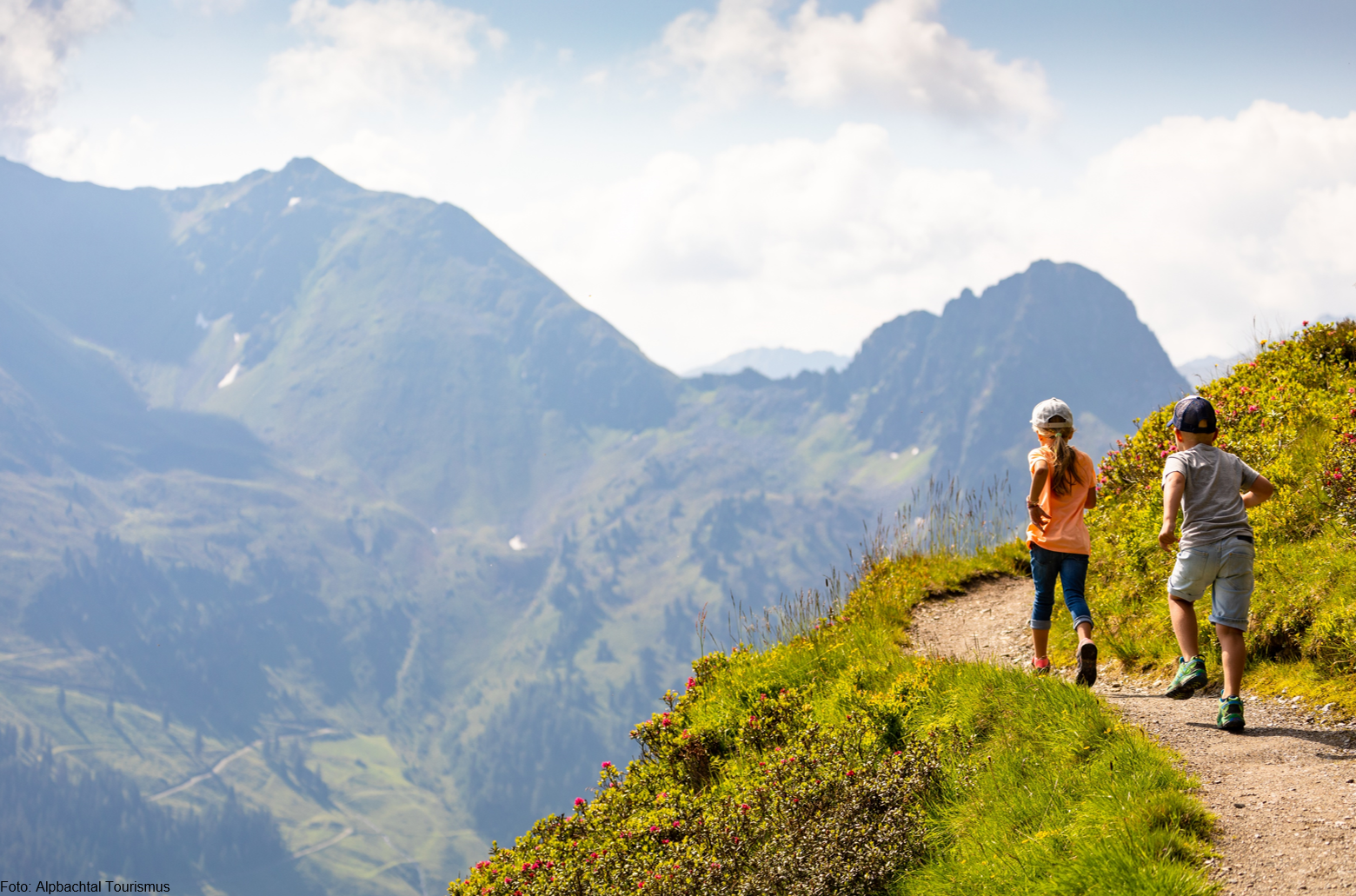 Children playing in the mountains in Summer